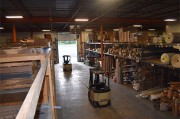 Managed Heated Storage warehouse interior with forklifts and stored materials