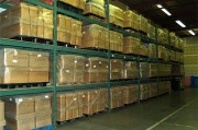 Organized pallet racking system in heated storage facility